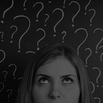 a woman with chalk question marks around her head