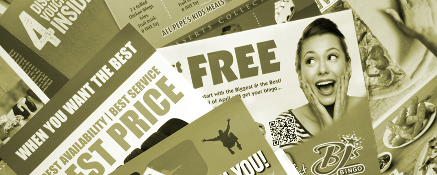 Assorted direct mail advertisements with bold offers like “FREE” and “BEST PRICE” spread out in a collage