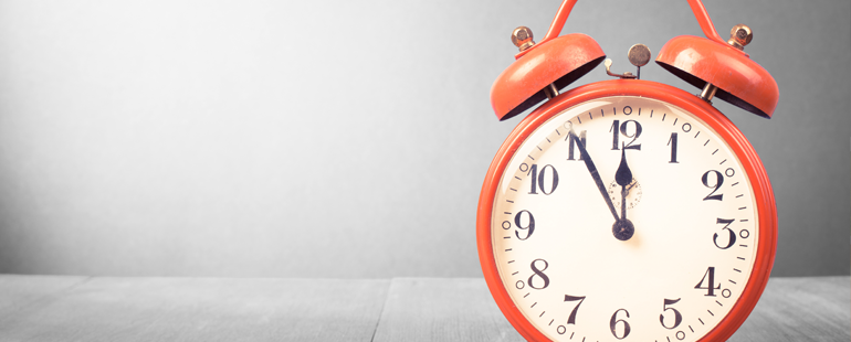 an orange alarm clock