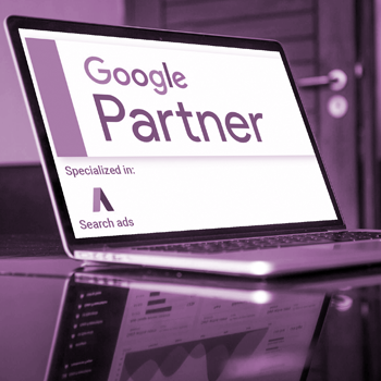 a laptop screen saying Google Partner on it