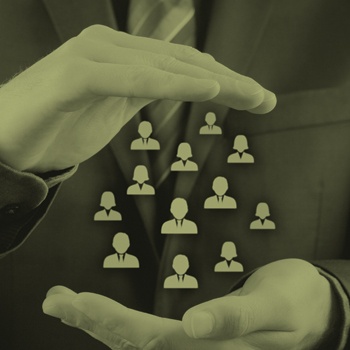 a man in a suit holding icon heads