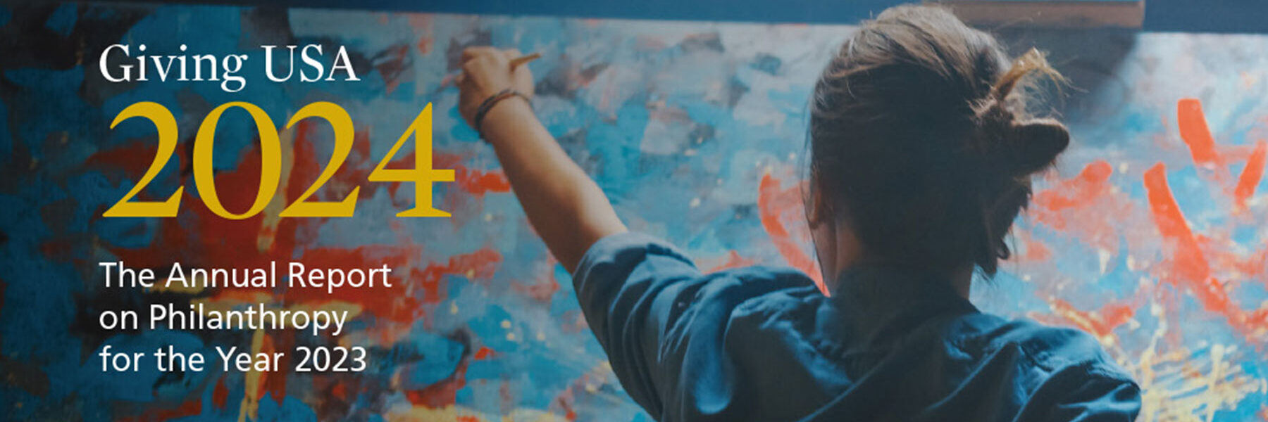 Giving USA 2024 Annual Report cover with person painting on a colorful abstract canvas