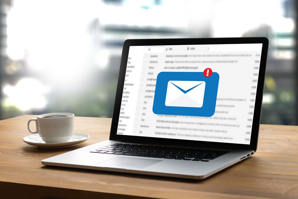 a laptop with an email client window open